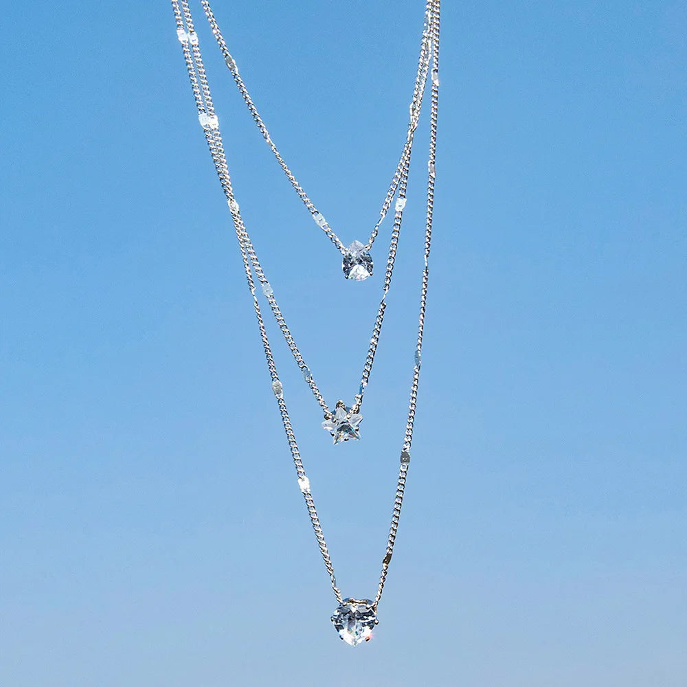 Colliers superposés avec pendentifs cœur